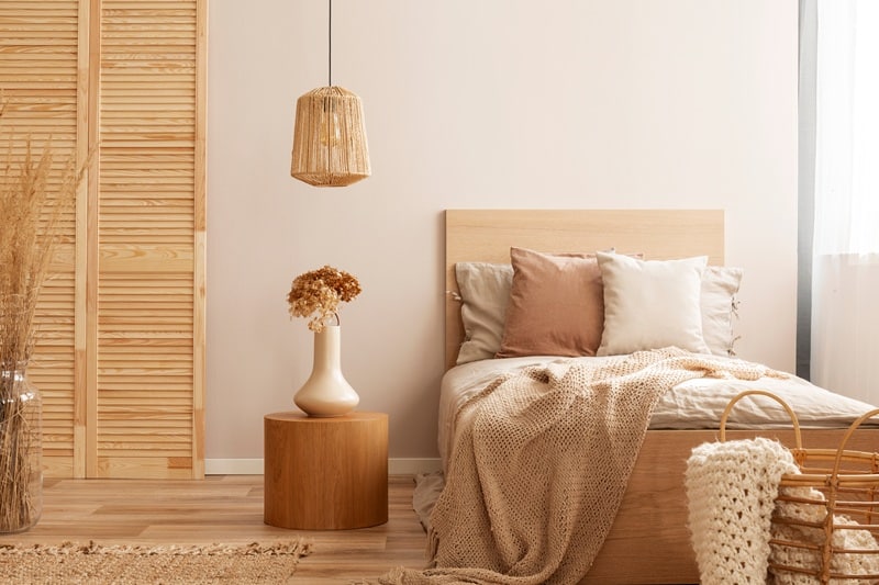 single,wooden,bed,with,natural,decoration,in,beige,colour,in